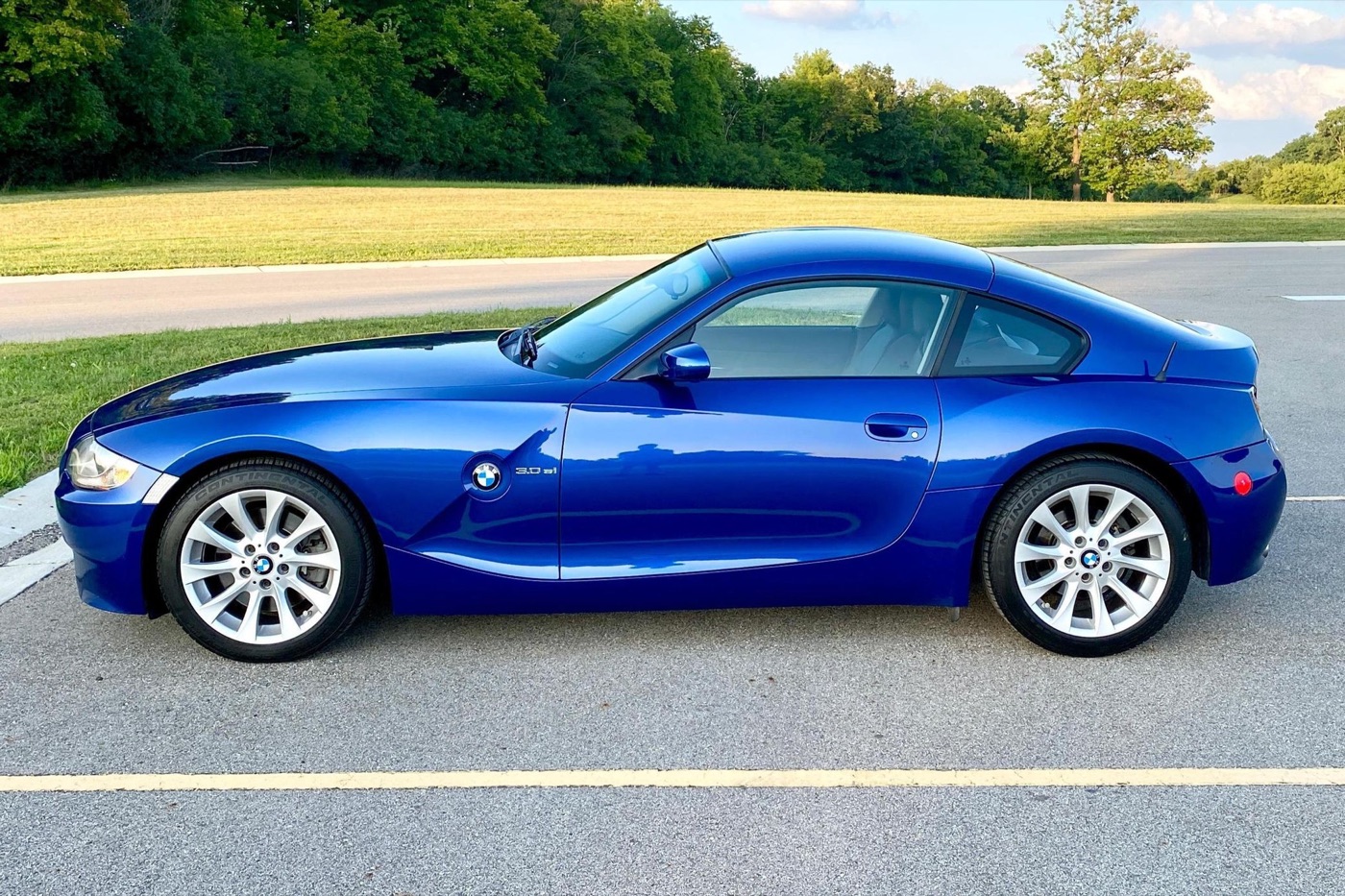 The 2008 Z4 3.0si Coupe today: stock side profile, factory 17-inch wheels, stock ride height