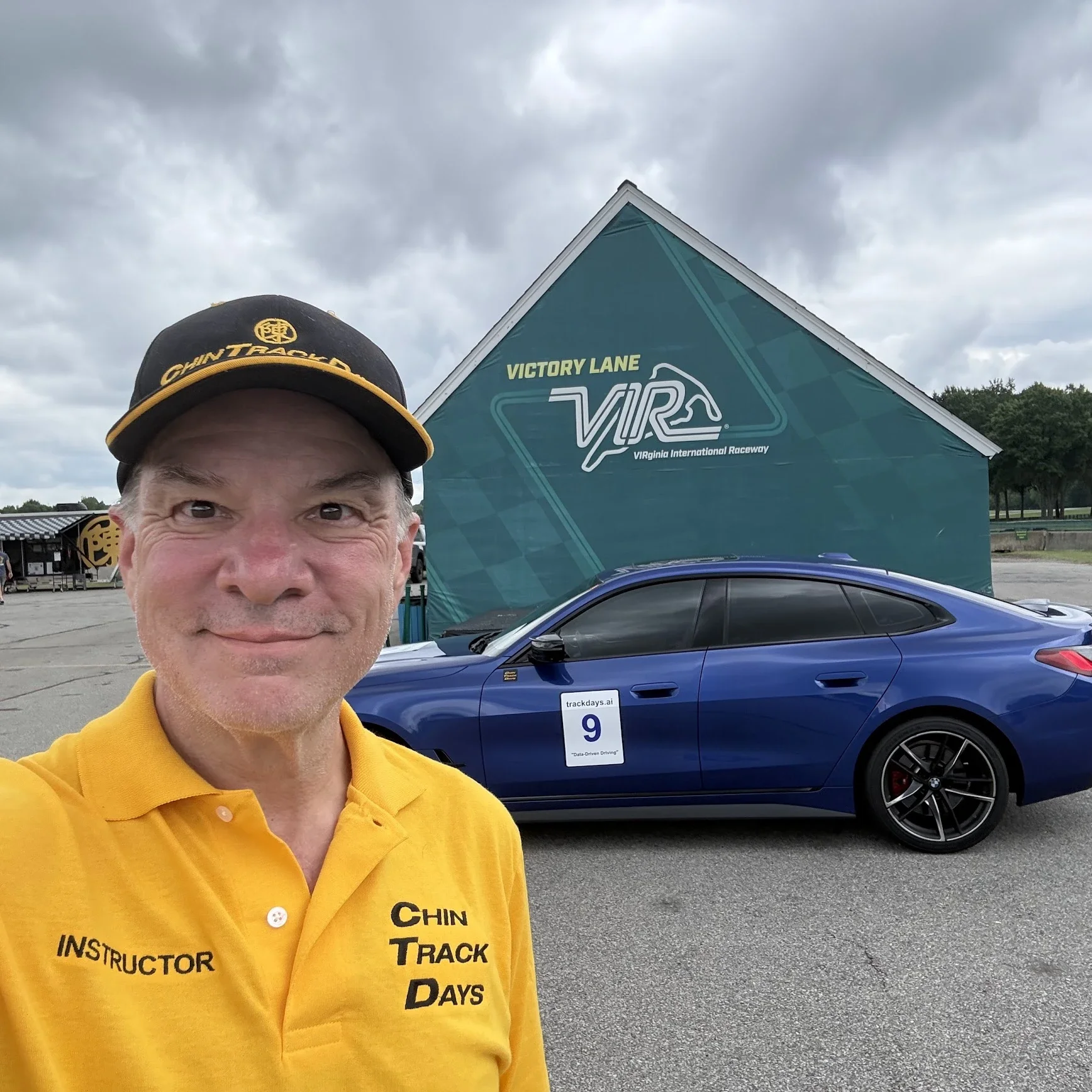 At VIR's Victory Lane with the M440i, working the weekend in Chin Track Days colors