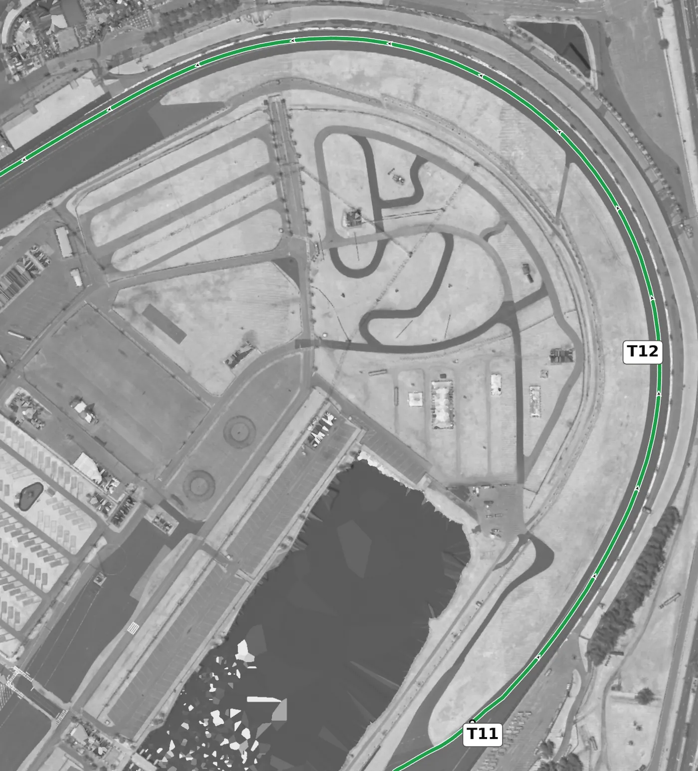 Daytona (road course) T12, the oval's Turns 3–4 race line close-up: 31° of banking (+60.25%), the steepest reading on the lap.