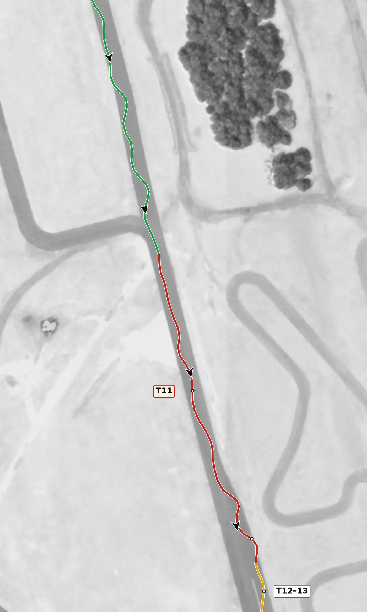 FIRM T11 race line close-up: A kink in the main straight, off camber (−0.9%).