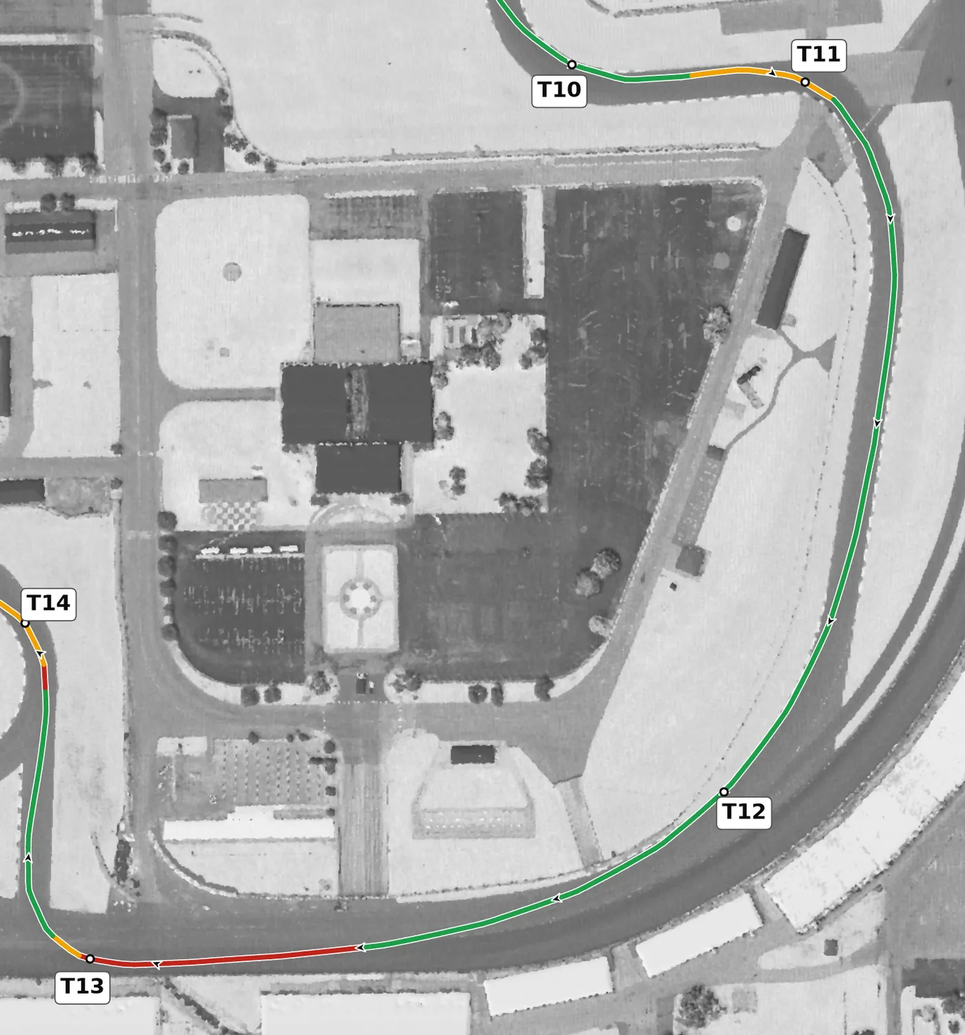IMS road course T12 race line close-up: Oval Turn 2: camber on the line rises from +2.6% at the apex to +10.7%, and the full pavement reaches about +15%. The lowest point on the lap is on the way in.