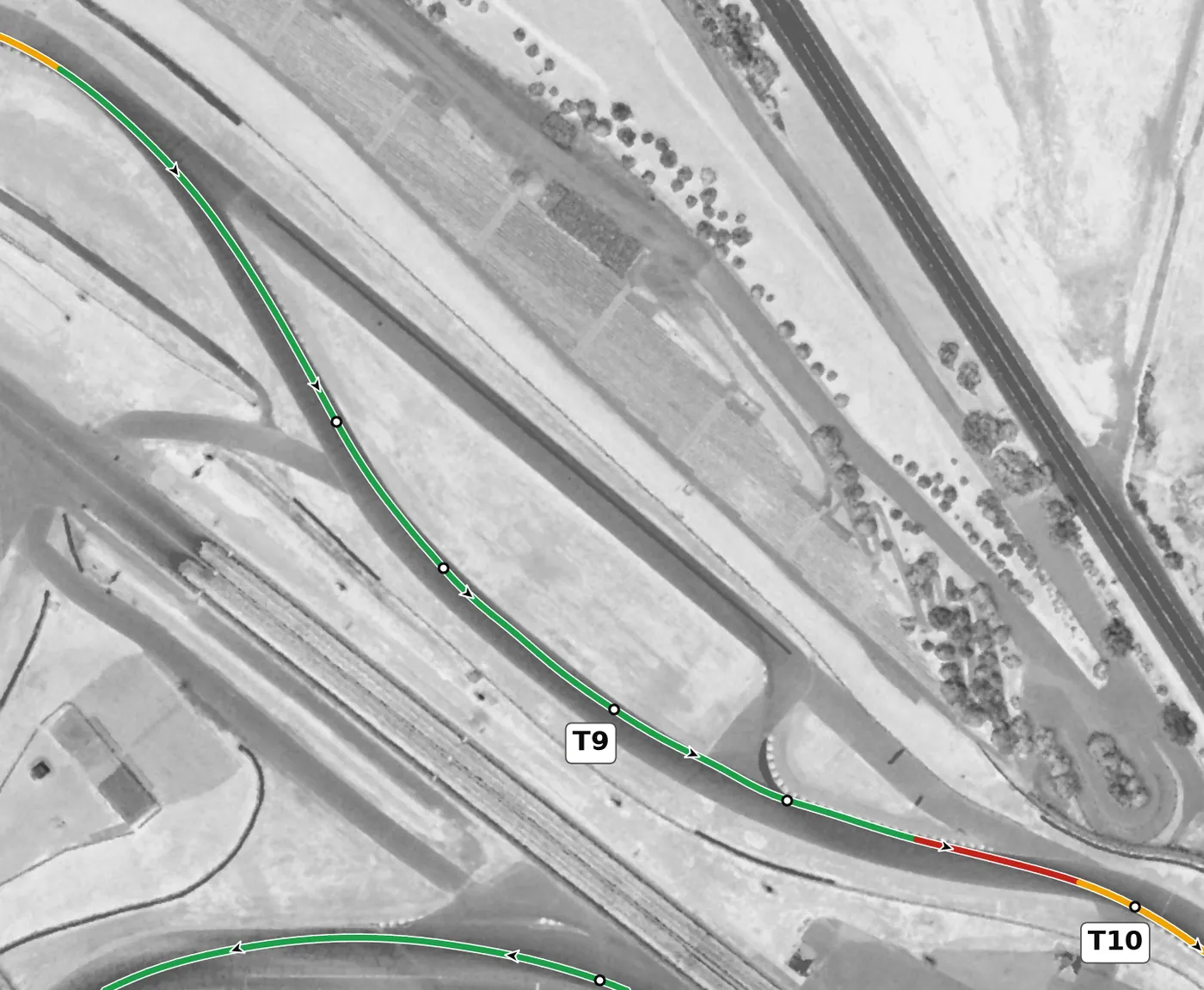 Sonoma Raceway T9 race line close-up: Mildly on camber (+0.7 to +0.9%) and gently downhill.
