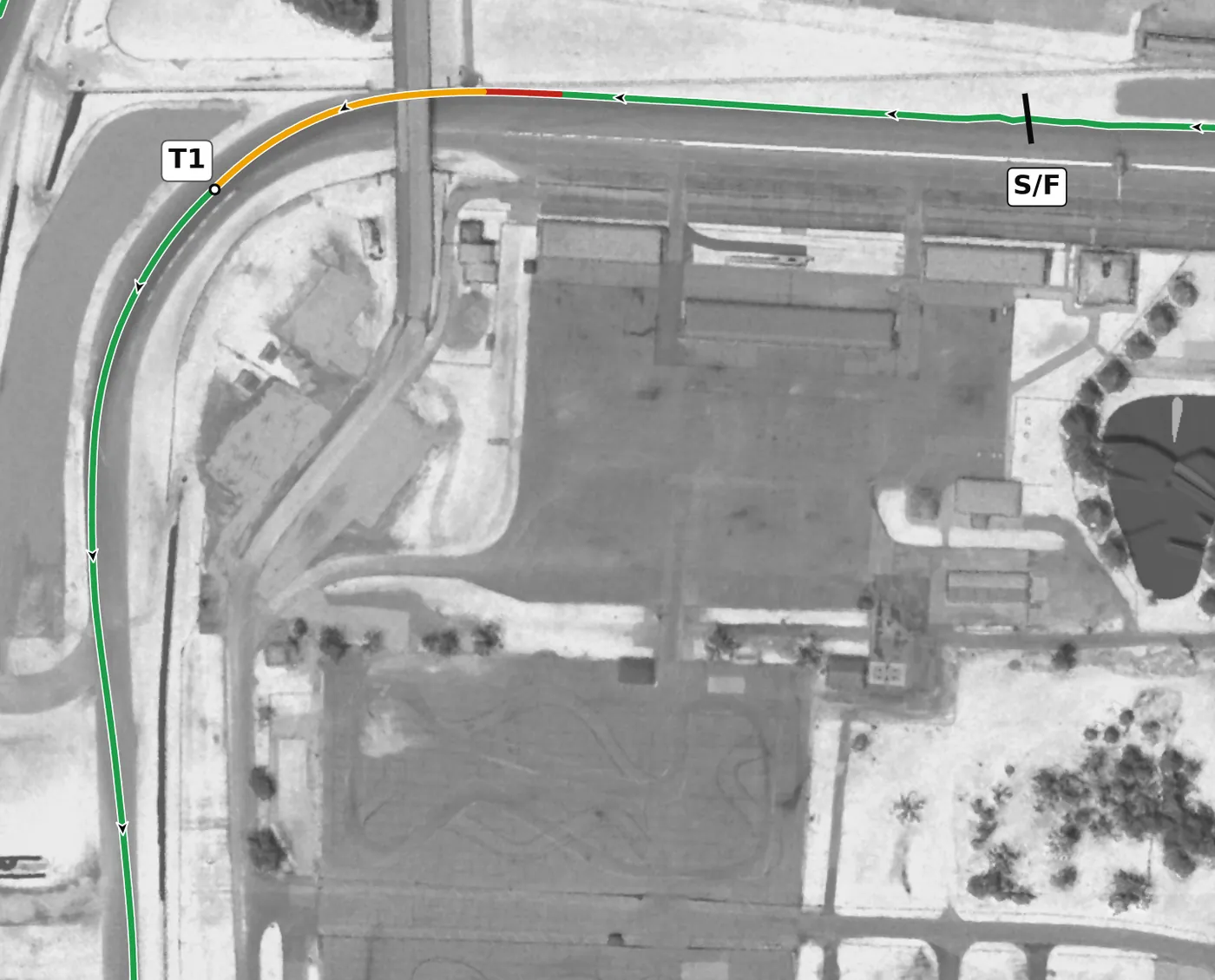 Mid-Ohio T1 race line close-up: +0.6% camber at the apex, then the road climbs 4 m to the exit.