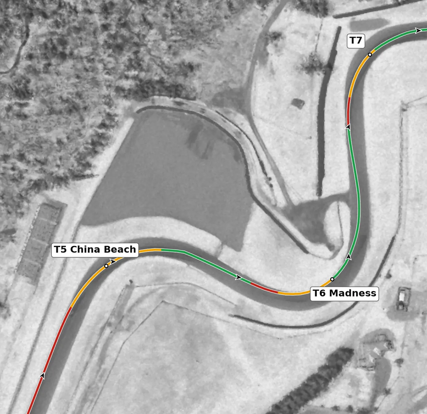 Mid-Ohio T6 — Madness race line close-up: The official T5. Banked +10% at the apex, not off camber, over the tightest crest on the lap; the exit falls at −9.5%.