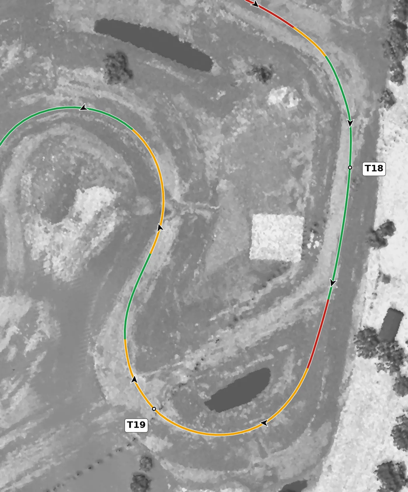 NCM Grand T19 race line close-up: A crest, then a −13.5% drop to the lowest point on the circuit.