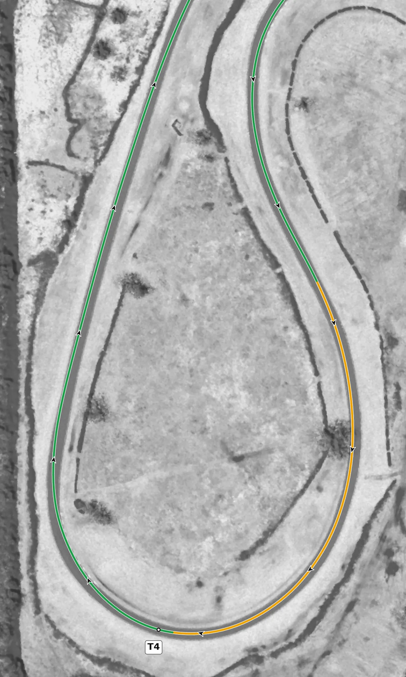Nelson Ledges T4, the Carousel race line close-up: 220° of right-hander, banked +9.8% at the apex: the most banked surface on the circuit. The bank washes out on the exit.
