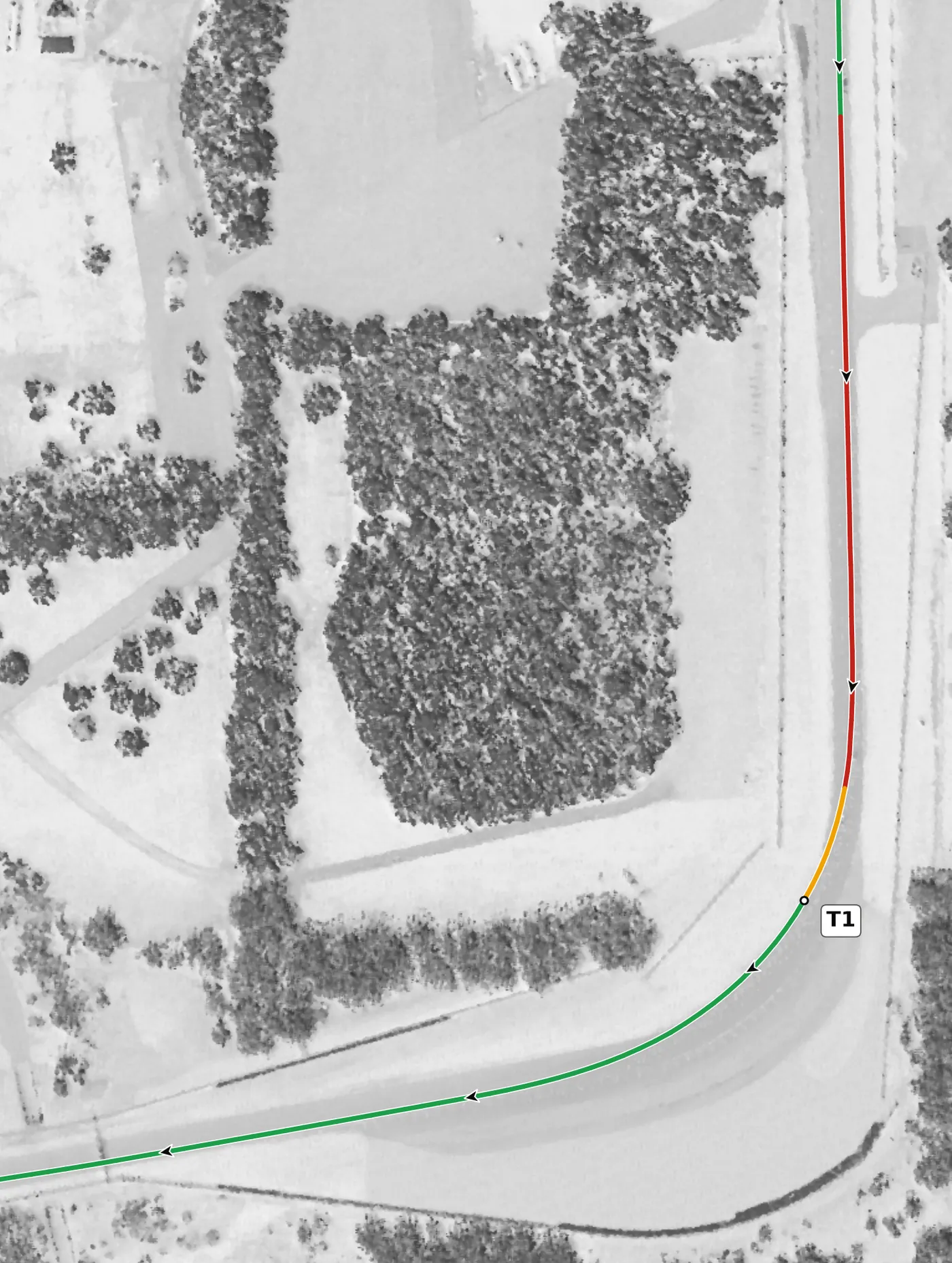 Road America T1 race line close-up: On camber (+1.6%) and level at the apex; the exit falls away at −3.6%.