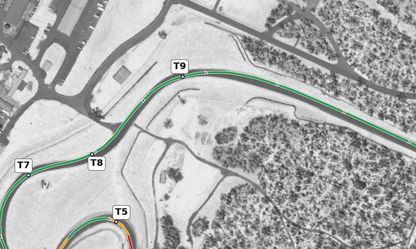 Summit Point T9 race line close-up: Banked +3.4%; the exit climbs 5.6 m over 260 m, the big climb of the lap.
