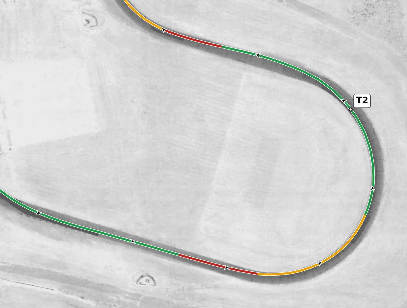 Thunderhill (East) T2 race line close-up: A long 180° left that drops 5.3 m into it; on camber (+3.8%).
