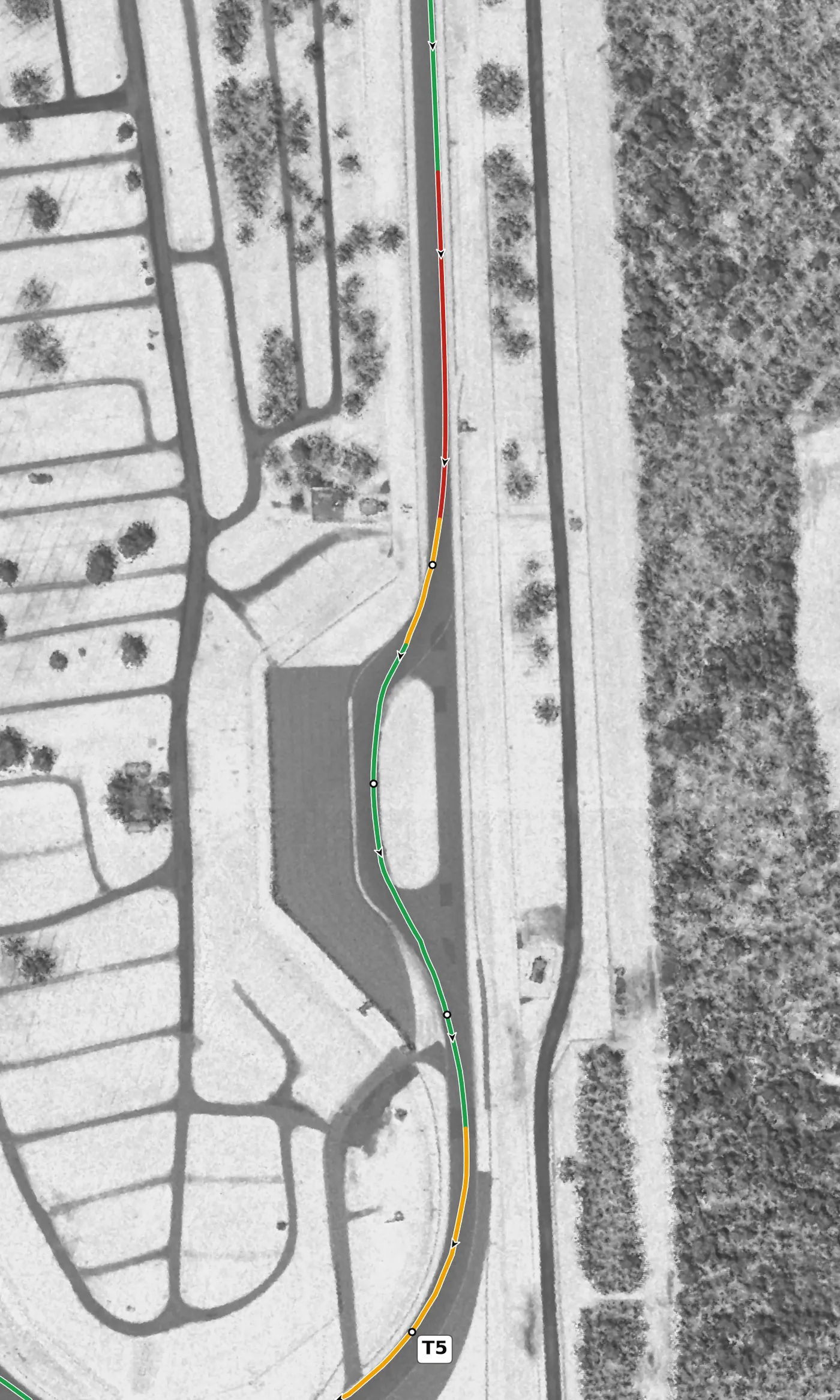 Watkins Glen The Bus Stop race line close-up: Climbs about 4.5 m through the chicane; its first apex is the only unbanked one on the lap (−0.4%), and its exit is the highest point of the circuit.