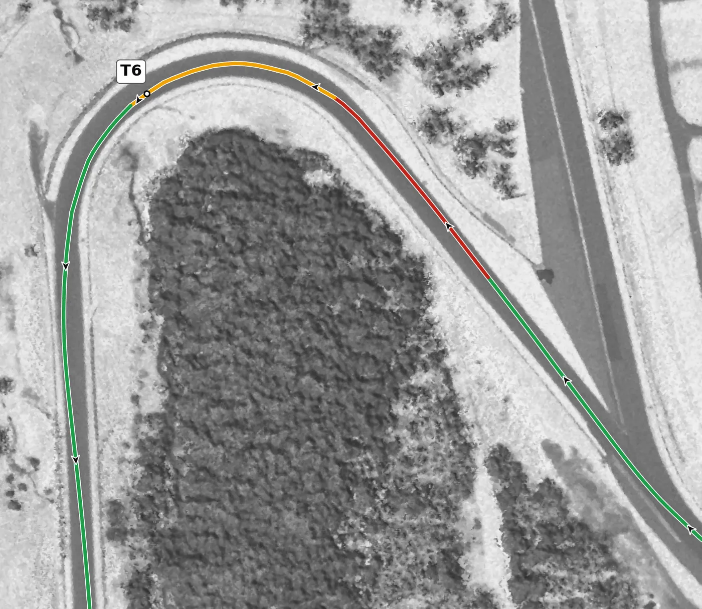 Watkins Glen T6 race line close-up: The steepest downhill apex on the lap (−6.6%), banked +8.6%, dropping 16.2 m through the corner.